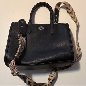 Chic Black Leather Satchel with Patterned Strap